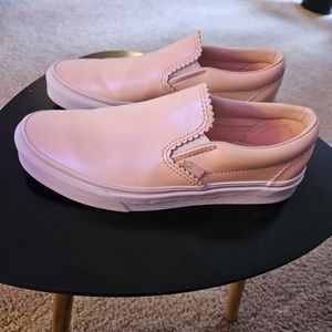 Luminescent pink Van's slip ons